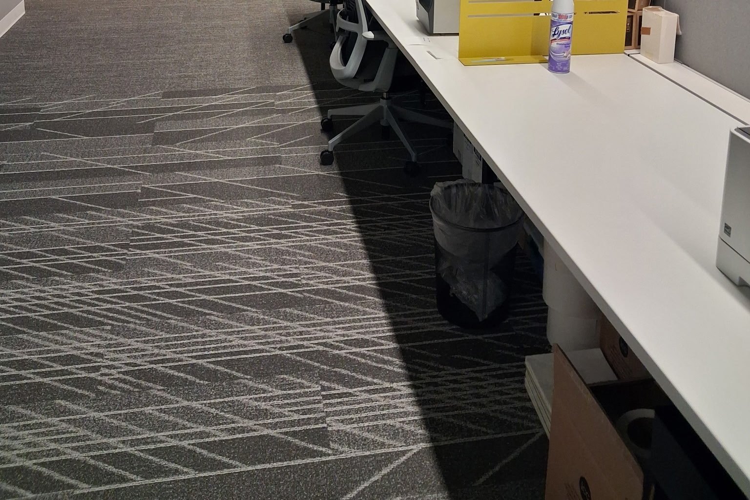 Open-plan office workstations and floors cleaned after a scheduled visit